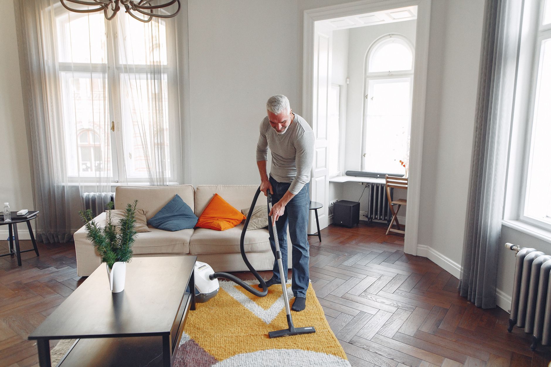 Thorough carpet vacuuming in an office space showing attention to detail