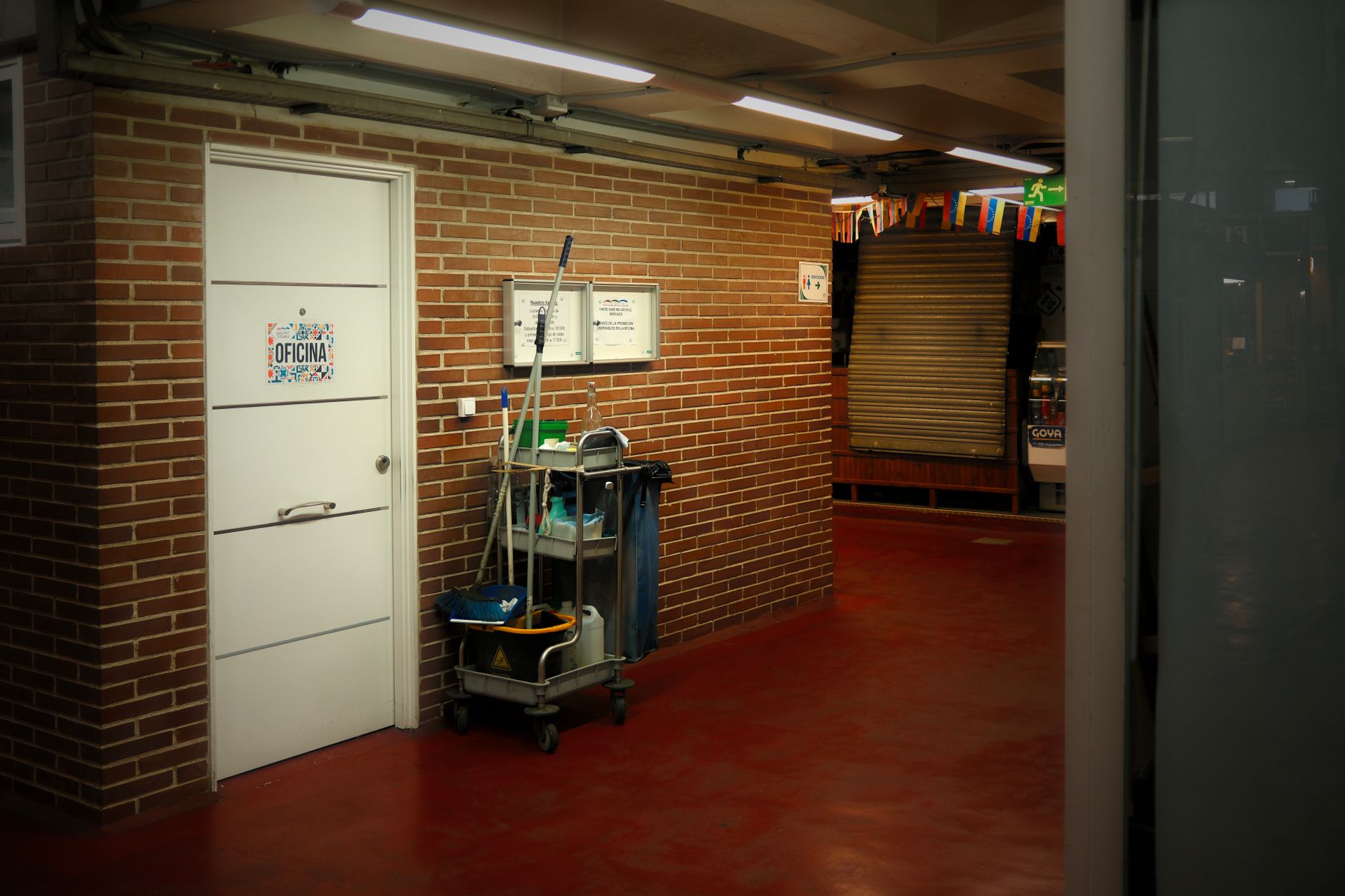Office hallway with cleaning equipment ready for the final walk-through